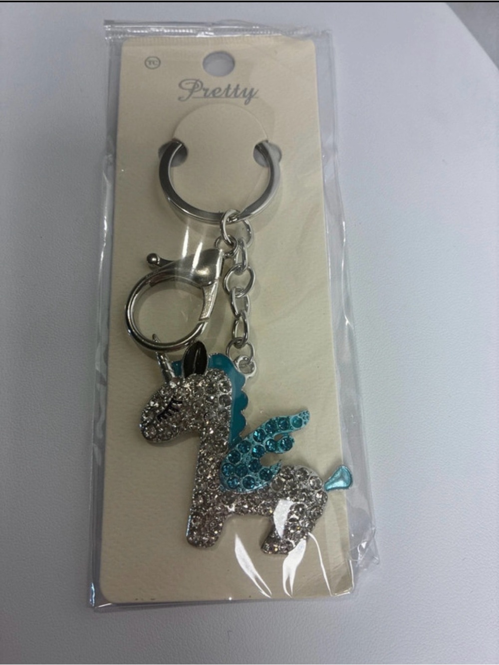 Silver Unicorn Keychain with Teal and Clear Crystal Accents